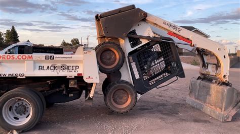 how to get a skid steer in neutral|drag a skid steer without running.